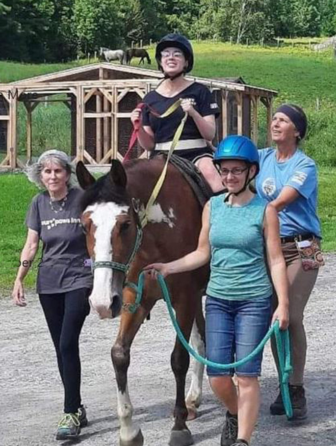 Rider at Rhythm of the Rein, Therapeutic Horsemanship in Marshfield Vermont